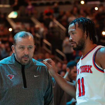 Nov 20, 2022; Phoenix, Arizona, USA; New York Knicks head coach Tom Thibodeau with guard Jalen Brunson (11) against the Phoenix Suns at Footprint Center. Mandatory Credit: Mark J. Rebilas-Imagn Images