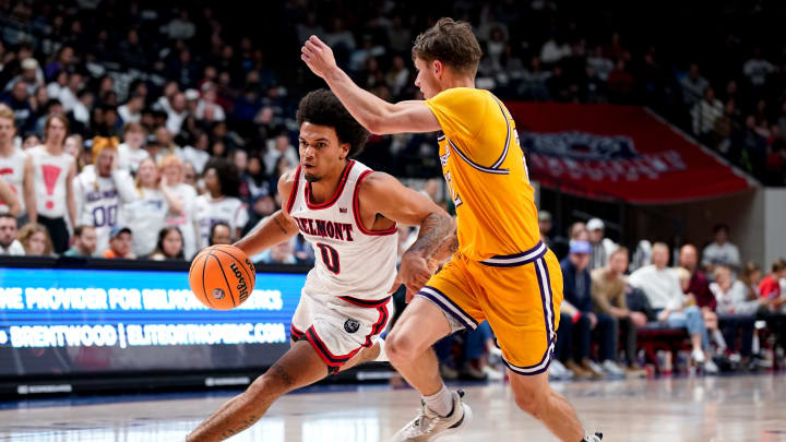 Belmont guard Ja'Kobi Gillespie (0) moves the ball apst Lipscomb guard Joe Anderson (22) during the second half at the Curb Event Center in Nashville, Tenn., Wednesday, Dec. 6, 2023.