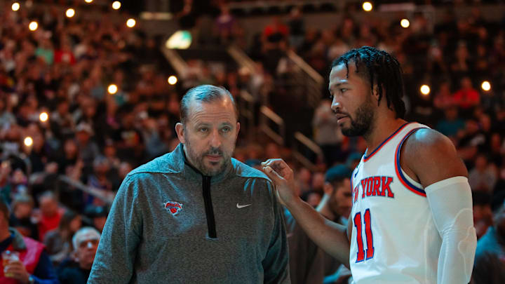 Nov 20, 2022; Phoenix, Arizona, USA; New York Knicks head coach Tom Thibodeau with guard Jalen Brunson (11) against the Phoenix Suns at Footprint Center. Mandatory Credit: Mark J. Rebilas-Imagn Images