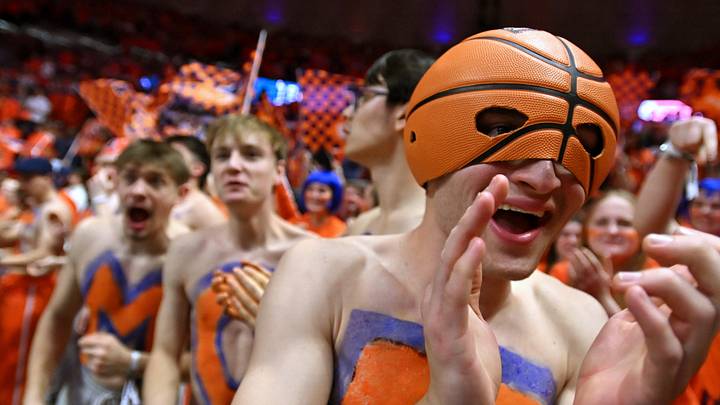 Feb 27, 2026; Champaign, Illinois, USA;  Illinois Fighting Illini fans cheer during the first half against the Michigan Wolverines at State Farm Center. Mandatory Credit: Ron Johnson-Imagn Images