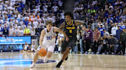 Feb 20, 2024; Provo, Utah, USA; Brigham Young Cougars guard Dallin Hall (30) dribbles past Baylor Bears forward Jalen Bridges (11) during the second half at Marriott Center. Mandatory Credit: Rob Gray-USA TODAY Sports