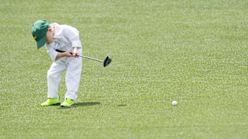 Apr 9, 2025; Augusta, Georgia, USA; Jordan Spieths son, Sammy, putts on the second green during the Par 3 Contest at Augusta National Golf Club. Mandatory Credit: Katie Goodale-Imagn Images
