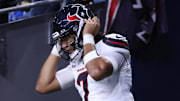 Oct 20, 2025; Seattle, Washington, USA; Houston Texans quarterback C.J. Stroud (7) runs onto the field for warmups prior to the game against the Seattle Seahawks at Lumen Field. Mandatory Credit: Kevin Ng-Imagn Images