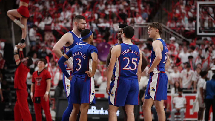 Feb 12, 2024; Lubbock, Texas, USA; Kansas Jayhawks center Hunter Dickinson (1), in the second half along with forward KJ Adams Jr. (5), guard Johnny Furphy (10), guard Nicolas Timberlake (25) and guard Dajuan Harris Jr (3) in the game against the Texas Tech Red Raiders at United Supermarkets Arena. Mandatory Credit: Michael C. Johnson-Imagn Images Feb 12, 2024; Lubbock, Texas, USA; Kansas Jayhawks center Hunter Dickinson (1), in the second half along with forward KJ Adams Jr. (5), guard Johnny Furphy (10), guard Nicolas Timberlake (25) and guard Dajuan Harris Jr (3) in the game against the Texas Tech Red Raiders at United Supermarkets Arena. Mandatory Credit: Michael C. Johnson-Imagn Images