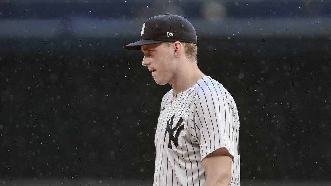 Sep 6, 2025; Bronx, New York, USA; New York Yankees first baseman Ben Rice (22) looks on as a steady rain begins to fall during the sixth inning against the Toronto Blue Jays at Yankee Stadium. Mandatory Credit: John Jones-Imagn Images Sep 6, 2025; Bronx, New York, USA; New York Yankees first baseman Ben Rice (22) looks on as a steady rain begins to fall during the sixth inning against the Toronto Blue Jays at Yankee Stadium. Mandatory Credit: John Jones-Imagn Images