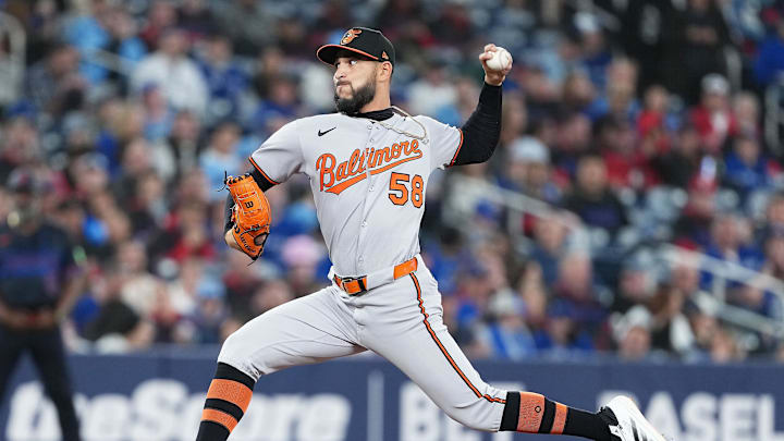 Mar 28, 2025; Toronto, Ontario, CAN; Baltimore Orioles pitcher Cionel Perez (58) throws a pitch against the Toronto Blue Jays during the seventh inning at Rogers Centre. Mandatory Credit: Nick Turchiaro-Imagn Images