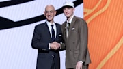 Jun 25, 2025; Brooklyn, NY, USA;  Kasparas Jakucionis stands with NBA commissioner Adam Silver after being selected as the 20th pick by the Miami Heat in the first round of the 2025 NBA Draft at Barclays Center. Mandatory Credit: Brad Penner-Imagn Images