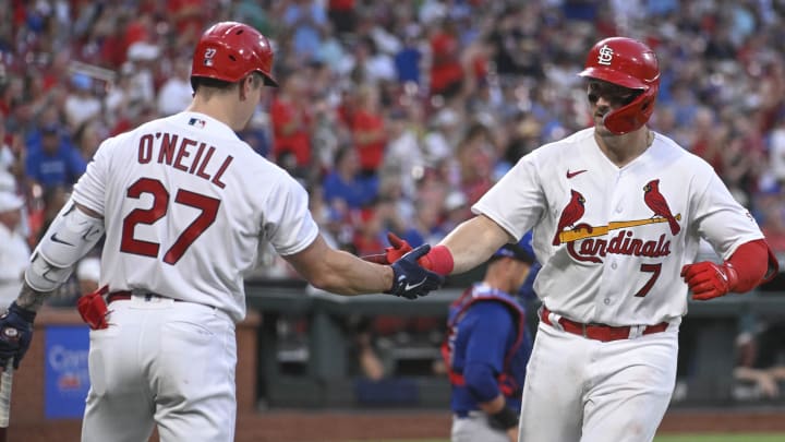 Jul 27, 2023; St. Louis, Missouri, USA; St. Louis Cardinals catcher Andrew Knizner (7) is congratulated by left fielder Tyler O'Neill (27) after Knizner hits a solo home run against the Chicago Cubs in the fourth inning at Busch Stadium. Mandatory Credit: Joe Puetz-USA TODAY Sports