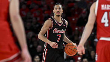 Houston guard Milos Uzan dribbles the ball during a recent game.