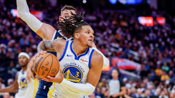 Oct 23, 2025; San Francisco, California, USA; Golden State Warriors guard Will Richard (3) protects the ball against the Denver Nuggets during the fourth quarter at Chase Center. Mandatory Credit: Bob Kupbens-Imagn Images