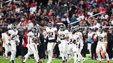 Dec 16, 2024; Paradise, Nevada, USA; Atlanta Falcons cornerback Kevin King (32) celebrates with teammates after making a play against the Las Vegas Raiders during the fourth quarter at Allegiant Stadium. Mandatory Credit: Stephen R. Sylvanie-Imagn Images