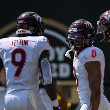 Aug 31, 2024; Nashville, Tennessee, USA;  Virginia Tech Hokies wide receiver Ali Jennings (0) scores off of a broken play against the Vanderbilt Commodores during the second half at FirstBank Stadium. Mandatory Credit: Steve Roberts-Imagn Images