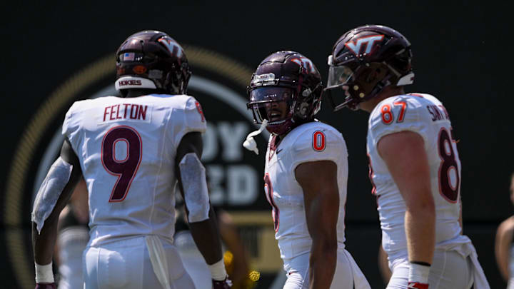 Aug 31, 2024; Nashville, Tennessee, USA;  Virginia Tech Hokies wide receiver Ali Jennings (0) scores off of a broken play against the Vanderbilt Commodores during the second half at FirstBank Stadium. Mandatory Credit: Steve Roberts-Imagn Images