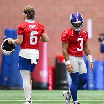 Jun 17, 2025; East Rutherford, NJ, USA; New York Giants quarterback Jaxson Dart (6) and quarterback Russell Wilson (3) interact during minicamp at Quest Diagnostics Training Center. Mandatory Credit: John Jones-Imagn Images