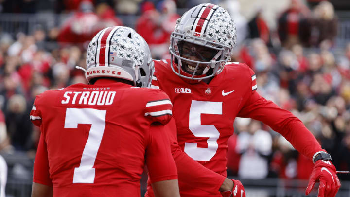 Nov 20, 2021; Columbus, Ohio, USA;  Ohio State Buckeyes wide receiver Garrett Wilson (5) celebrates his touch down with quarterback C.J. Stroud (7) in the first half against the Michigan State Spartans at Ohio Stadium. Mandatory Credit: Rick Osentoski-USA TODAY Sports