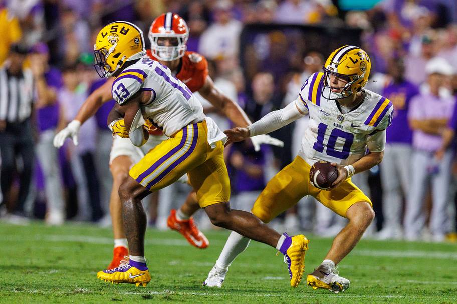 LSU quarterback Sam Leavitt fakes a handoff to running back Dilin Jones against Clemson.