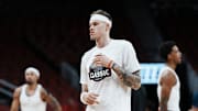 Louisville Cardinals forward Kasean Pryor (7) warms up with the team before an exhibition game at the KFC Yum! Center in Louisville, Kentucky Tuesday October 28, 2028.