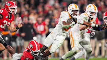 Tennessee running back Dylan Sampson (6) is taken down by Georgia inside linebacker Smael Mondon, Jr. (2) during a college football game between Tennessee and Georgia at Sanford Stadium in Athens, Ga., on Saturday, November 16, 2024.