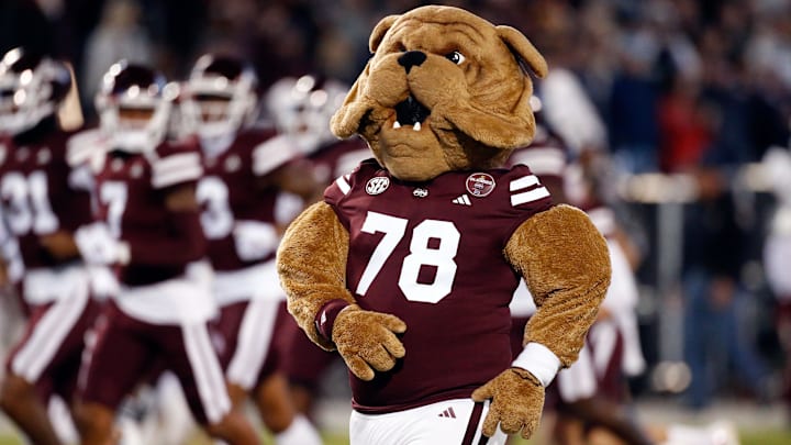 Nov 23, 2023; Starkville, Mississippi, USA; Mississippi State Bulldogs mascot Bully runs onto the field with the team prior to the game against the Mississippi Rebels at Davis Wade Stadium at Scott Field. Mandatory Credit: Petre Thomas-Imagn Images