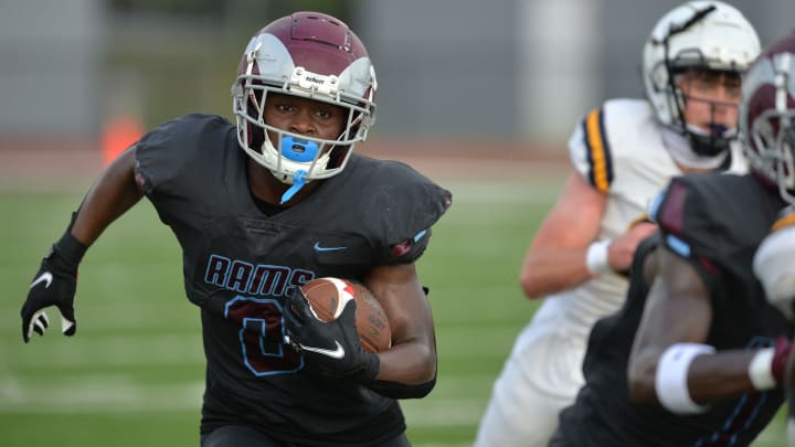 Riverview running back DJ Johnson carries the ball in a game last season against Lehigh.