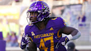 Oct 2, 2021; Greenville, North Carolina, USA;  East Carolina Pirates running back Rahjai Harris (47) celebrates after scoring a touchdown against the Tulane Green Wave during the second half at Dowdy-Ficklen Stadium. Mandatory Credit: James Guillory-Imagn Images