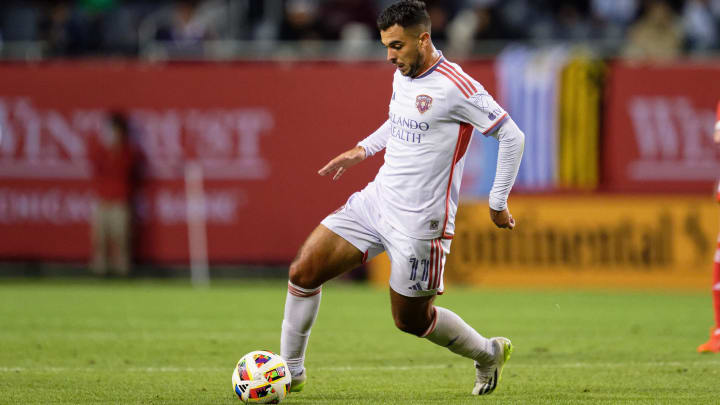 May 29, 2024; Chicago, Illinois, USA;  Orlando City SC forward Martin Ojeda (11) controls the ball against the Chicago Fire FC at Soldier Field. Mandatory Credit: Jamie Sabau-USA TODAY Sports