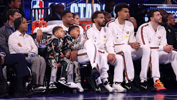 Trae Young and the Team Chuck's Global Stars look on during the 74th NBA All-Star Game.