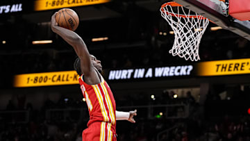 Dec 23, 2022; Atlanta, Georgia, USA; Atlanta Hawks forward AJ Griffin (14) dunks the ball against the Detroit Pistons
