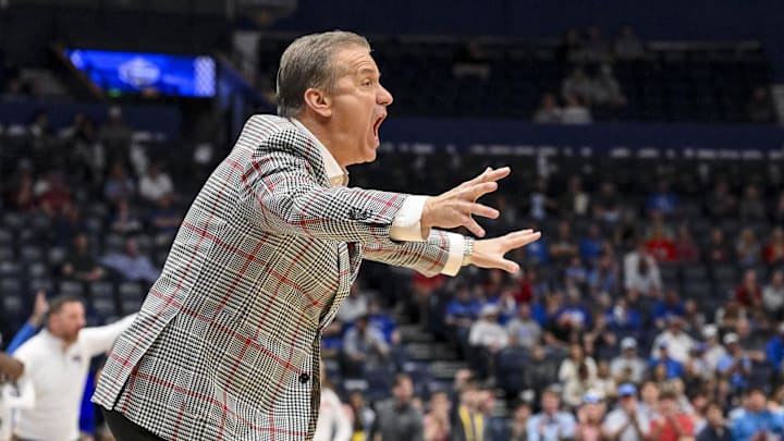 Arkansas Razorbacks head coach Calipari screams to his team against the Mississippi Rebels during the first half at Bridgestone Arena. 