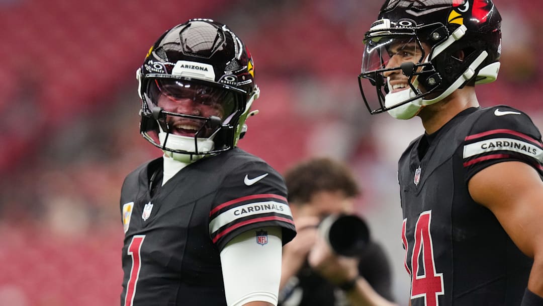 Arizona Cardinals quarterback Kyler Murray (1) chats with teammate Michael Wilson (14) before their game against the Tennessee Titans at State Farm Stadium in Glendale on Oct. 5, 2025.