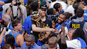 Oklahoma City Thunder forward Chet Holmgren (7) holds the NBA Finals Larry O'Brien Championship Trophy at the end of game seven of the 2025 NBA Finals at Paycom Center.