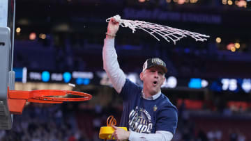 Apr 8, 2024; Glendale, AZ, USA;  Connecticut Huskies head coach Dan Hurley celebrates after cutting down the net after defeating the Purdue Boilermakers in the national championship game of the Final Four of the 2024 NCAA Tournament at State Farm Stadium. Mandatory Credit: Robert Deutsch-USA TODAY Sports