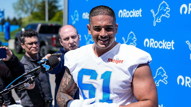 Detroit Lions defensive lineman Ahmed Hassanein (61) speaks after practice during rookie mini camp