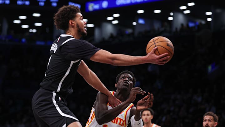 Mar 16, 2025; Brooklyn, New York, USA; Brooklyn Nets forward Cameron Johnson (2) goes to the basket against Atlanta Hawks forward Mouhamed Gueye (18) during the second half at Barclays Center. Mandatory Credit: Vincent Carchietta-Imagn Images Mar 16, 2025; Brooklyn, New York, USA; Brooklyn Nets forward Cameron Johnson (2) goes to the basket against Atlanta Hawks forward Mouhamed Gueye (18) during the second half at Barclays Center. Mandatory Credit: Vincent Carchietta-Imagn Images