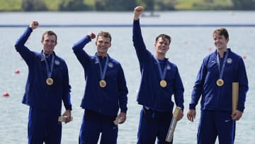 Nick Mead, Justin Best, Michael Grady and Liam Corrigan celebrate their gold medal in the men's four during the Paris 2024 Olympic Summer Games at Vaires-sur-Marne Nautical Stadium.