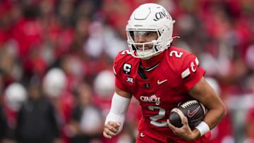Oct 25, 2025; Cincinnati, Ohio, USA;  Cincinnati Bearcats quarterback Brendan Sorsby (2) runs with the ball against the Baylor Bears in the first half at Nippert Stadium. Mandatory Credit: Aaron Doster-Imagn Images