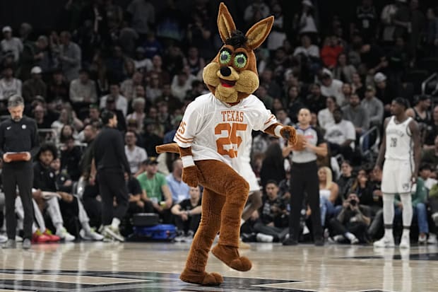 The San Antonio Spurs Coyote mascot has a Texas Longhorns jersey during the second half against Brooklyn N