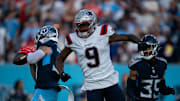 Tennessee Titans safety Amani Hooker intercepts a pass intended for New England Patriots wide receiver Kayshon Boutte
