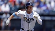 Aug 3, 2025; Tampa, Florida, USA; Tampa Bay Rays shortstop Taylor Walls (6) singles against the Los Angeles Dodgers in the fifth inning at George M. Steinbrenner Field. Mandatory Credit: Nathan Ray Seebeck-Imagn Images