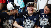 Apr 6, 2025; Tampa, FL, USA; Connecticut Huskies guard Kaitlyn Chen (20) and guard Paige Bueckers (5) celebrates after winning the national championship of the women's 2025 NCAA tournament against the South Carolina Gamecocks at Amalie Arena. Mandatory Credit: Nathan Ray Seebeck-Imagn Images