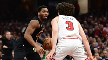 Nov 15, 2024; Cleveland, Ohio, USA; Chicago Bulls guard Josh Giddey (3) defends Cleveland Cavaliers guard Donovan Mitchell (45) 