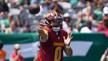Aug 10, 2024; East Rutherford, New Jersey, USA; Washington Commanders quarterback Marcus Mariota (0) passes during the first quarter against the New York Jets at MetLife Stadium. Mandatory Credit: Lucas Boland-USA TODAY Sports