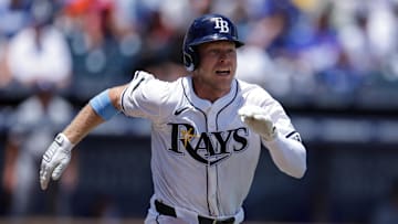 Aug 3, 2025; Tampa, Florida, USA; Tampa Bay Rays shortstop Taylor Walls (6) singles against the Los Angeles Dodgers in the fifth inning at George M. Steinbrenner Field. Mandatory Credit: Nathan Ray Seebeck-Imagn Images