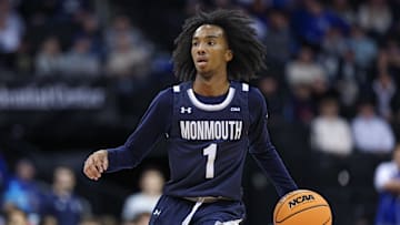Nov 30, 2024; Newark, New Jersey, USA; Monmouth Hawks guard Abdi Bashir Jr. (1) dribbles up court during the first half against the Seton Hall Pirates at Prudential Center. Mandatory Credit: Vincent Carchietta-Imagn Images
