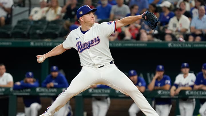Apr 25, 2024; Arlington, Texas, USA; Texas Rangers pitcher Josh Sborz (66) throws to the plate during the ninth inning against the Seattle Mariners at Globe Life Field. Mandatory Credit: Raymond Carlin III-USA TODAY Sports