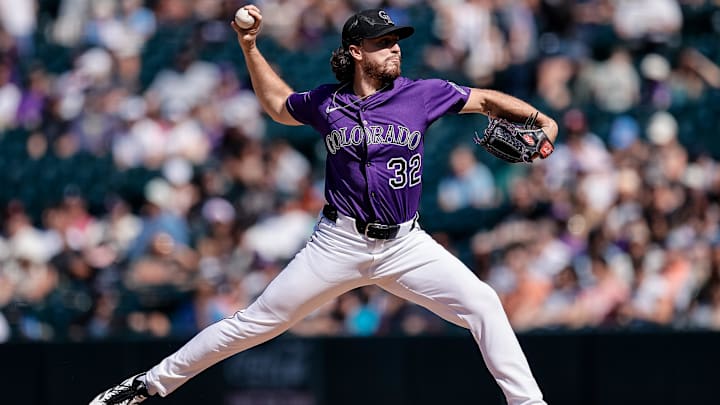 Sep 1, 2025; Denver, Colorado, USA; Colorado Rockies starting pitcher Chase Dollander (32) pitches in the fourth inning against the San Francisco Giants at Coors Field. 