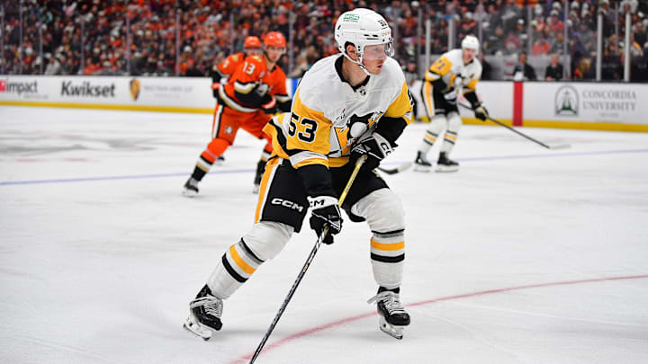 Oct 14, 2025; Anaheim, California, USA; Pittsburgh Penguins right wing Philip Tomasino (53) moves the puck against the Anaheim Ducks during the first period at Honda Center.