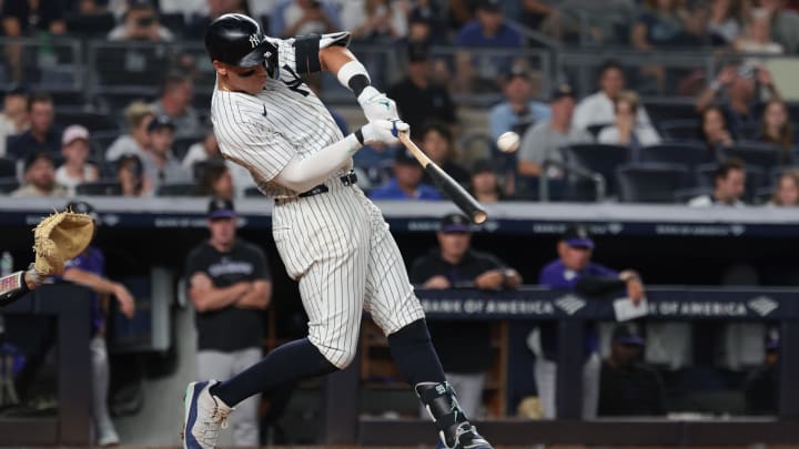 Aug 23, 2024; Bronx, New York, USA;  New York Yankees center fielder Aaron Judge hits a solo home run.