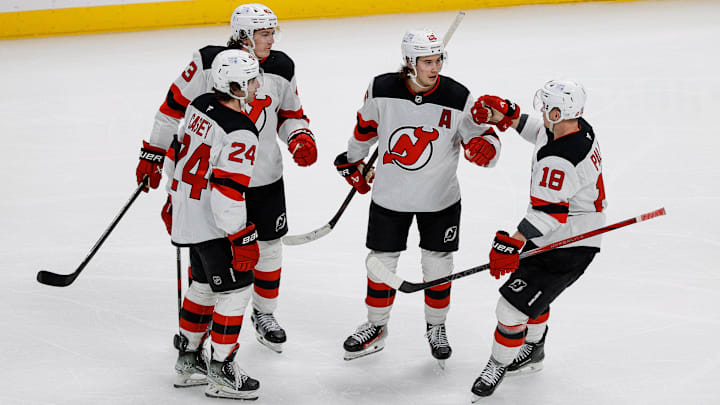 Feb 26, 2025; Denver, Colorado, USA; New Jersey Devils center Jack Hughes (86) celebrates his goal with defenseman Luke Hughes (43) and defenseman Seamus Casey (24) and left wing Ondrej Palat (18) in the third period against the Colorado Avalanche at Ball Arena. Mandatory Credit: Isaiah J. Downing-Imagn Images Feb 26, 2025; Denver, Colorado, USA; New Jersey Devils center Jack Hughes (86) celebrates his goal with defenseman Luke Hughes (43) and defenseman Seamus Casey (24) and left wing Ondrej Palat (18) in the third period against the Colorado Avalanche at Ball Arena. Mandatory Credit: Isaiah J. Downing-Imagn Images