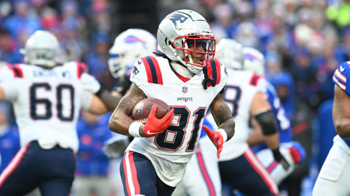 Dec 31, 2023; Orchard Park, New York, USA; New England Patriots wide receiver DeMario Douglas (81) runs a sweep against the Buffalo Bills in the first quarter at Highmark Stadium. Mandatory Credit: Mark Konezny-USA TODAY Sports